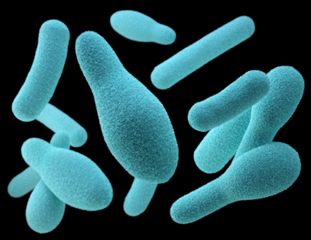 Blue bacteria on black background